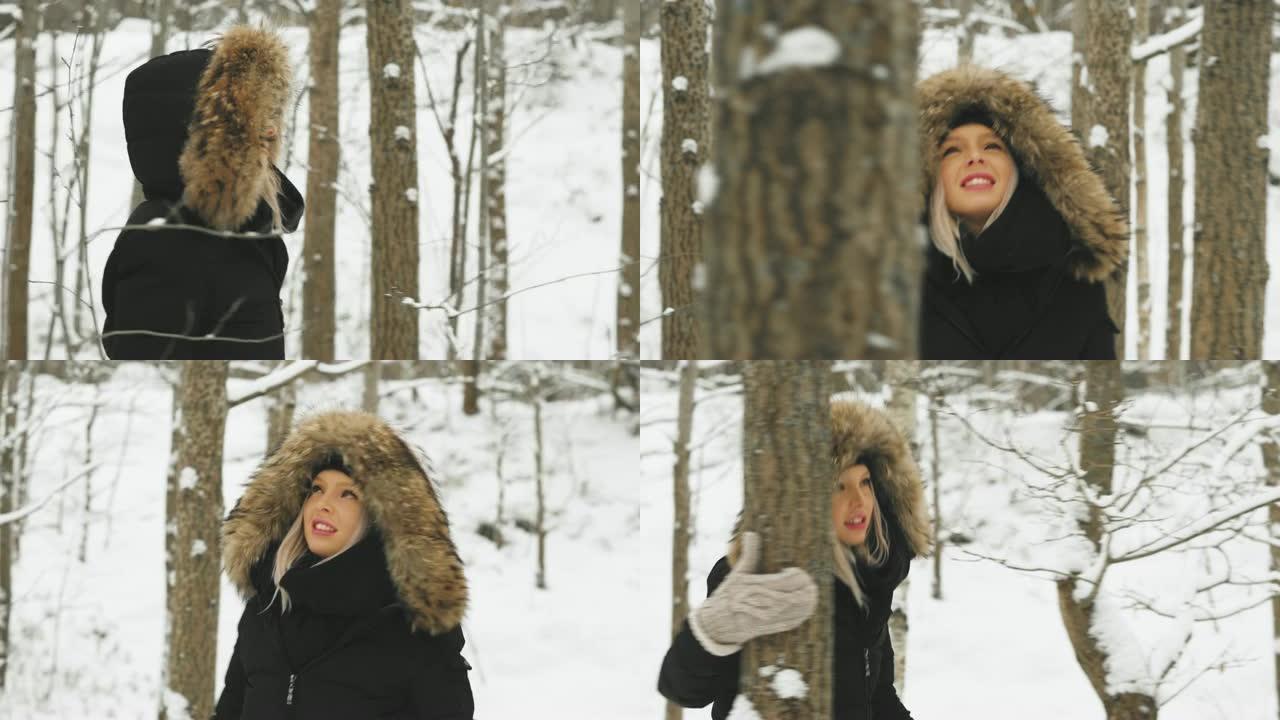 在下雪的冬天，穿着山羊大衣的美丽年轻女子