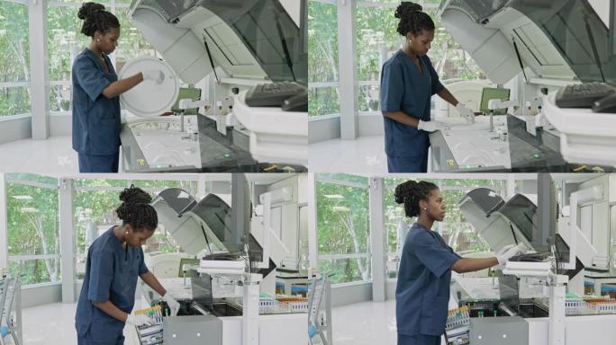 非裔美国病理学技术员在实验室中使用计算机