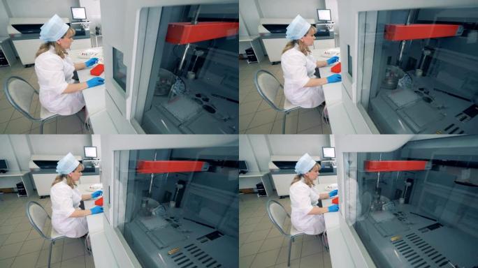实验室配备生化分析仪和一位女性专家