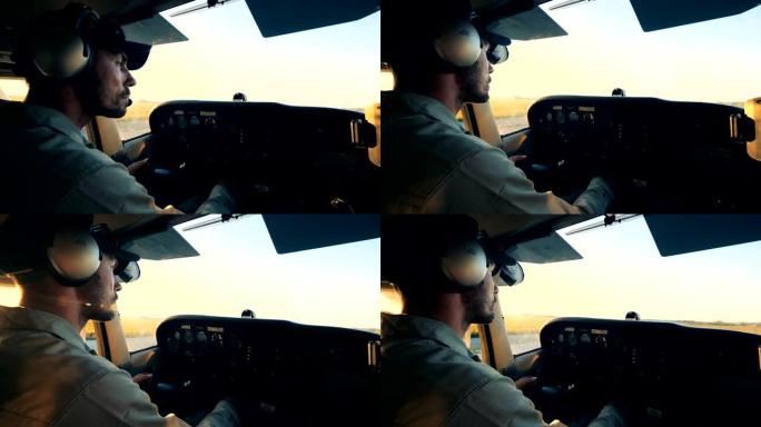 带有控制面板和男飞行员的飞机驾驶舱