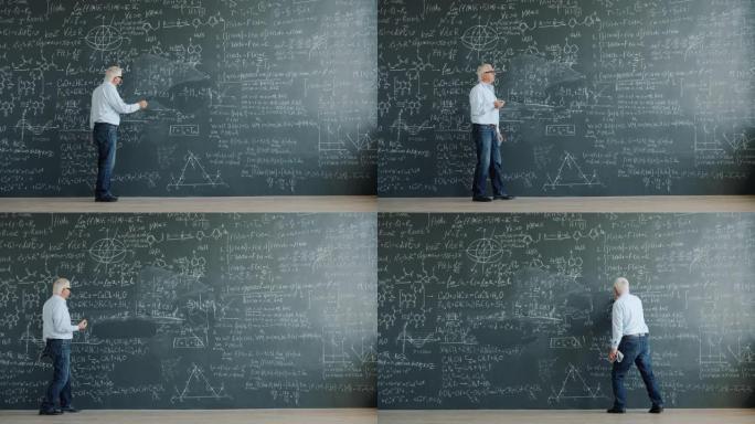 成人科学家在课堂上行走的黑板上写公式的时间流逝
