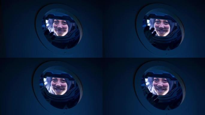 女宇航员从飞船向相机挥手