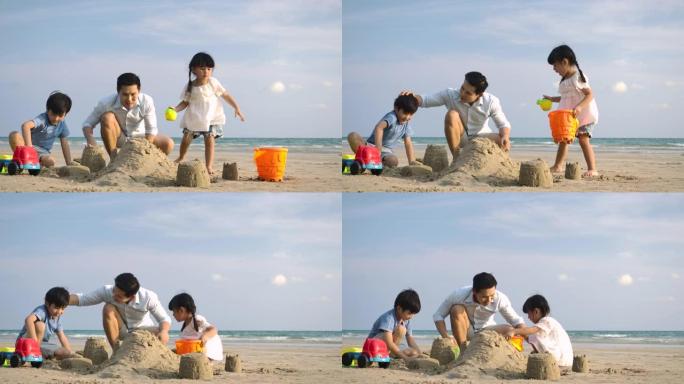 暑假的家人一起在海滩上玩沙堡。慢动作。家庭、假期和旅行概念。
