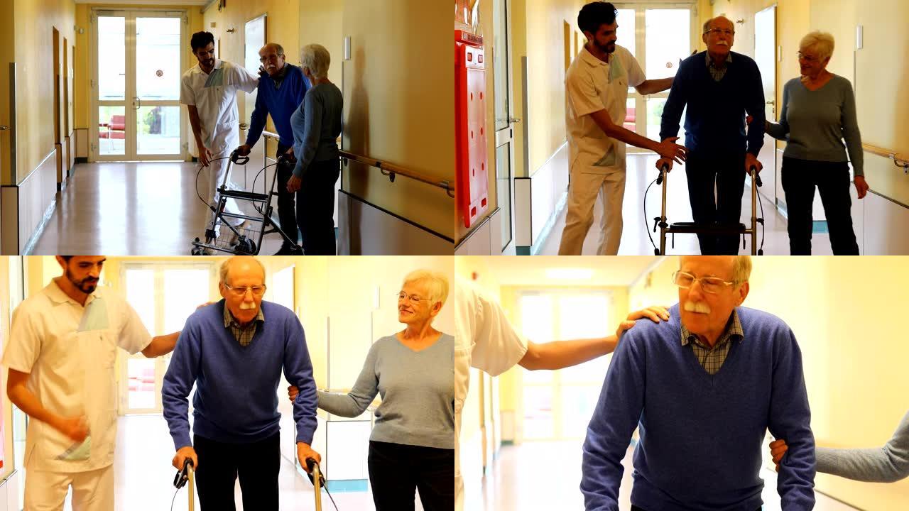 男子与妻子和护士在康复中心进行步行锻炼