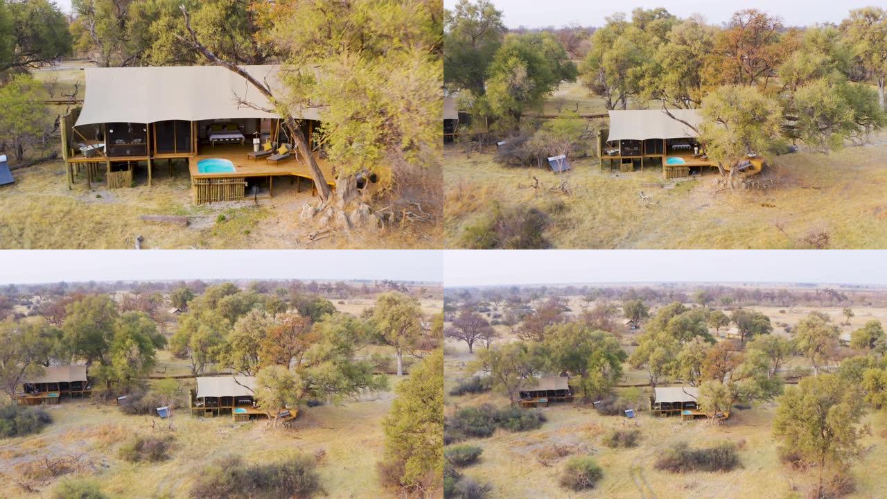 博茨瓦纳奥卡万戈三角洲图鲁迪野生动物园营地客人帐篷的空中缩小视图