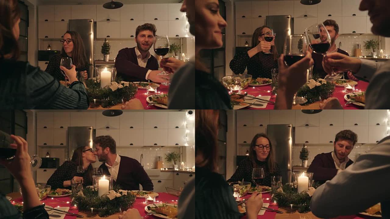 一起吃圣诞晚餐。干杯碰杯外国人
