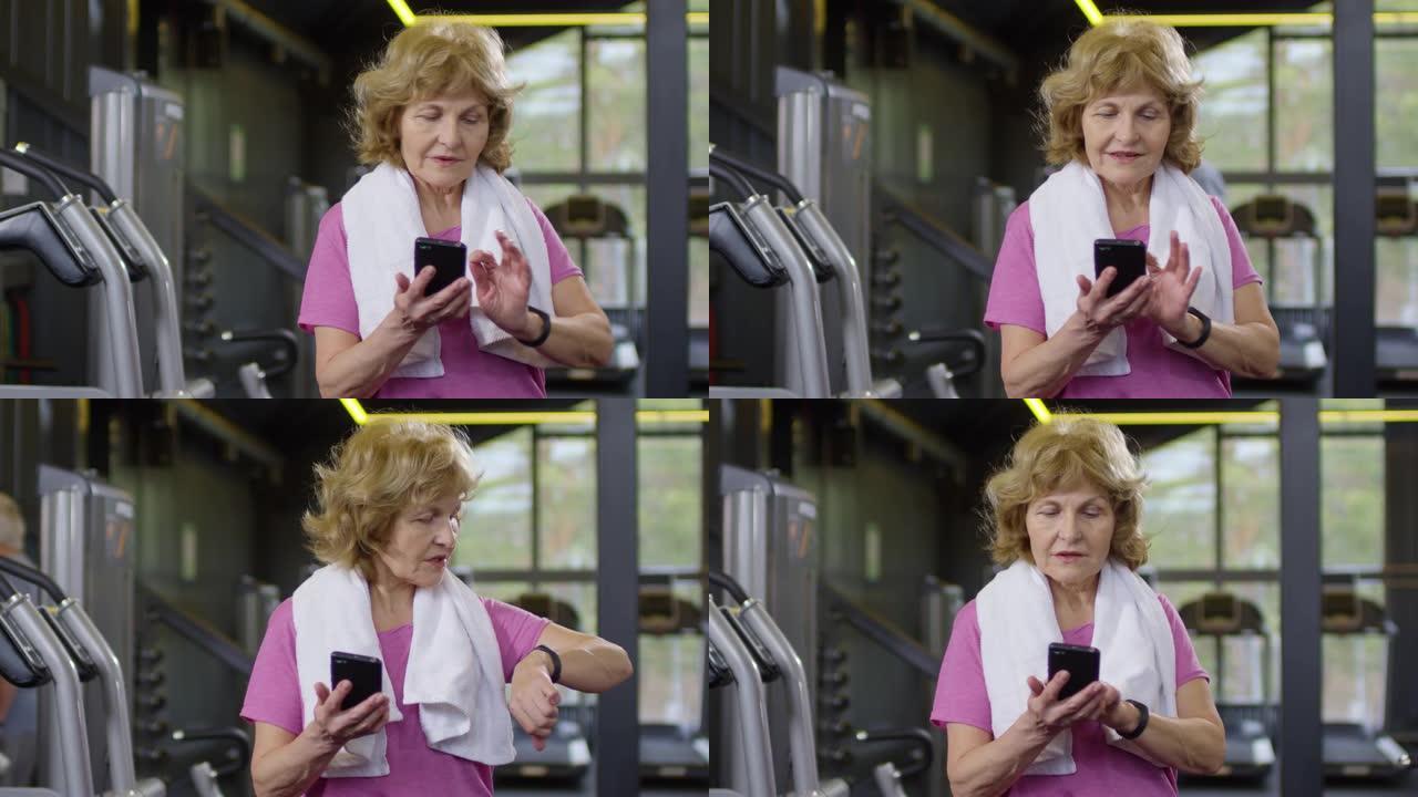 在健身房使用设备的老妇人