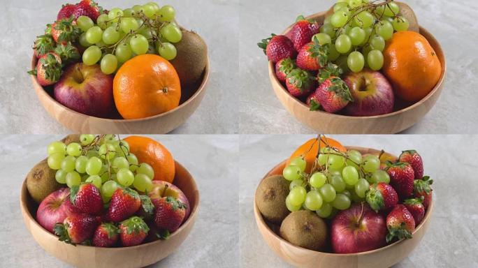 木碗中混合水果的4k旋转。