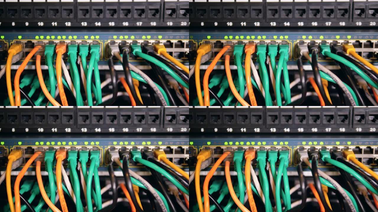 彩色电线插在服务器机房的一台电脑上。