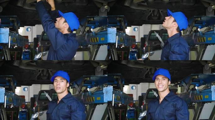 在车间里，一名机械师在检查并完成机器后，竖起大拇指并微笑着，因为汽车已经成功维修。