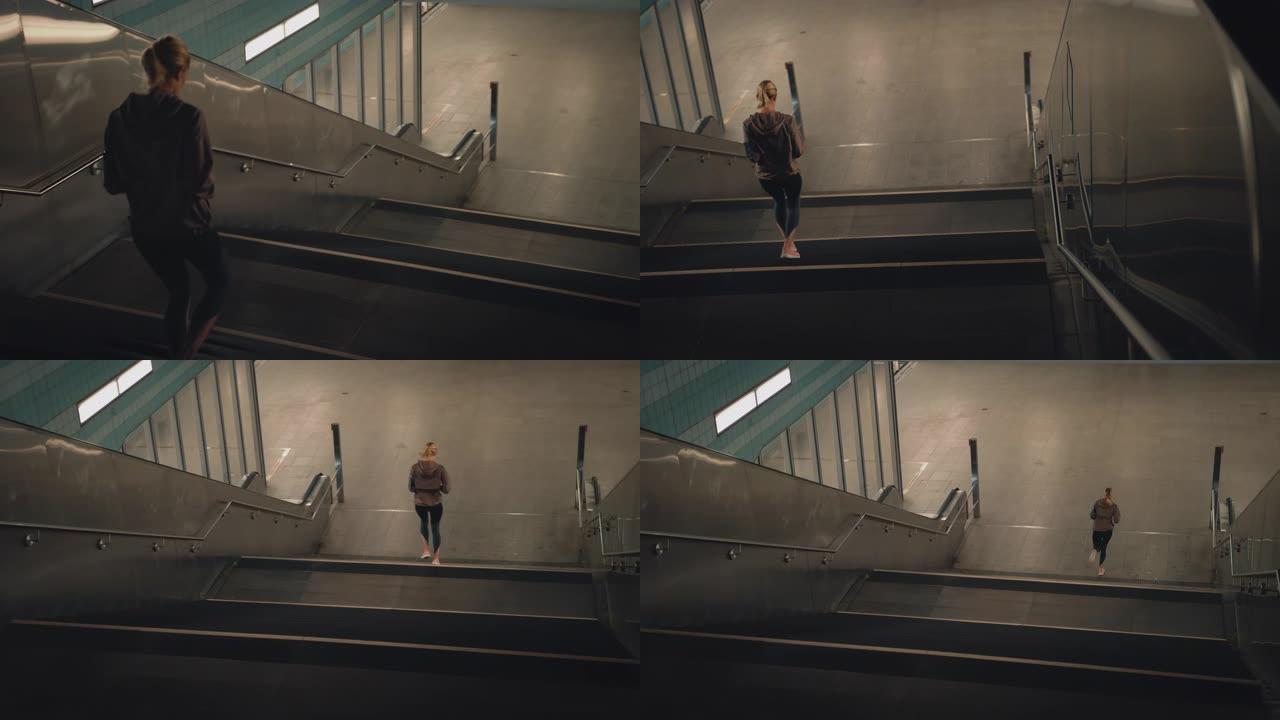 年轻女女运动员在地铁上奔跑