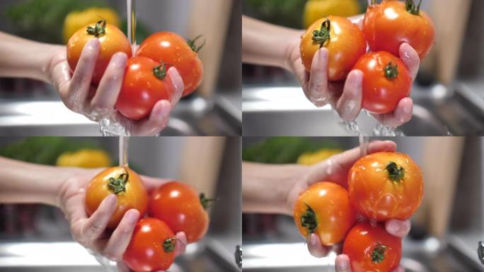 女人洗新鲜西红柿的特写镜头