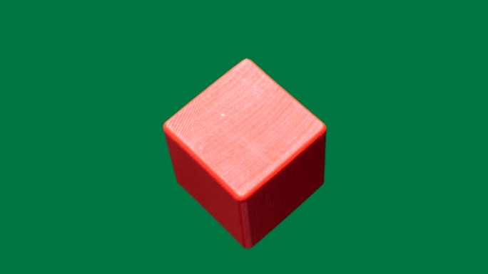 木制红色立方体隔离。循环旋转。