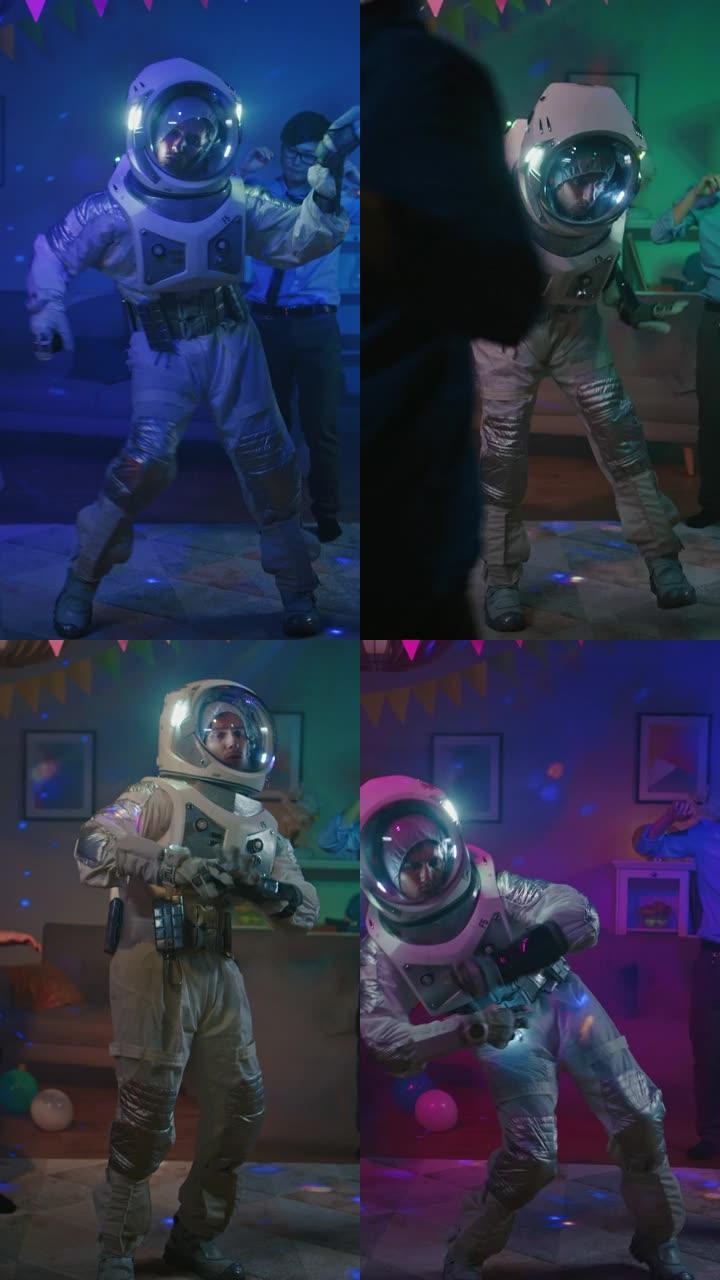 在大学服装派对上: 穿着太空服的有趣家伙跳舞，做时髦时髦的机器人舞蹈现代动作。漂亮的女孩，跳舞的男孩