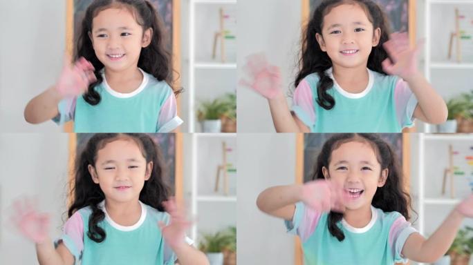 描绘亚洲可爱的小女孩微笑和跳舞呆在家里防止冠状病毒或Covid-19.Homeschooling流行