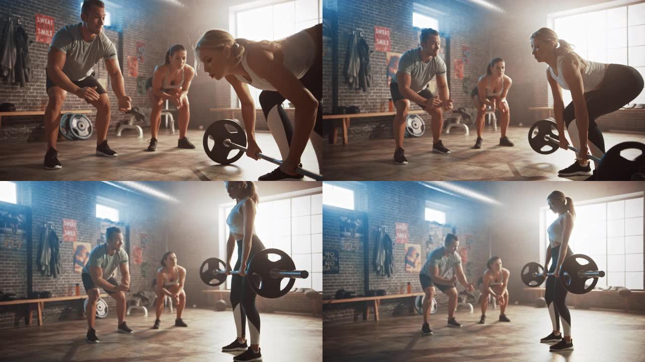 男性和女性健身教练鼓励一位美丽健康的运动年轻女子在日常锻炼中。她正在成功举起沉重的杠铃。培训在带有激