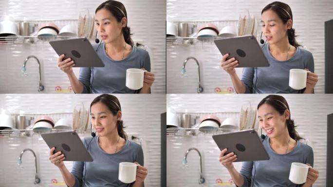 亚洲妇女在家中进行视频通话