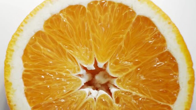 旋转橙色切片。橙子脐橙果粒橙饮品
