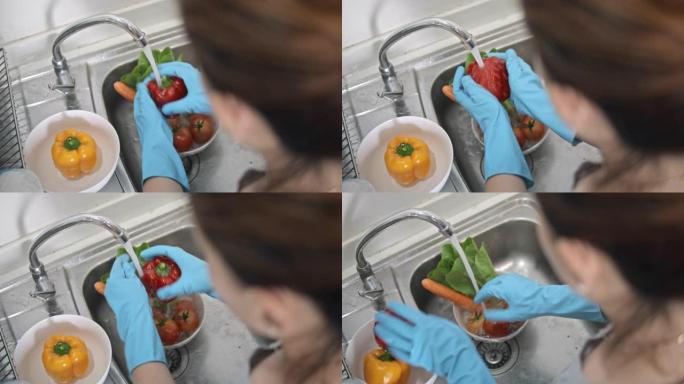 妇女清洗和准备蔬菜，慢动作