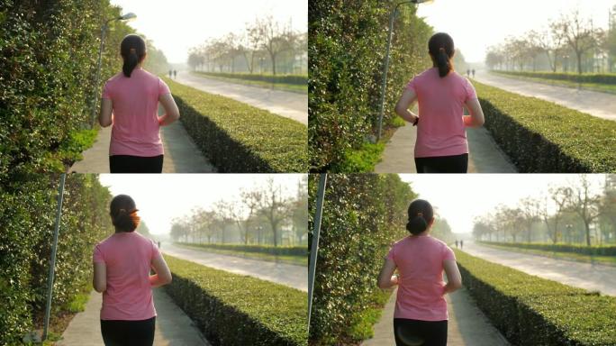 慢镜头:女人在公园里跑步做心脏运动