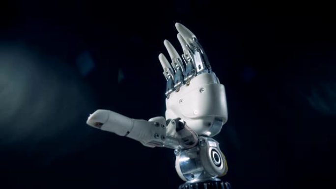 假手自动弯曲手指，特写。未来机器人概念。