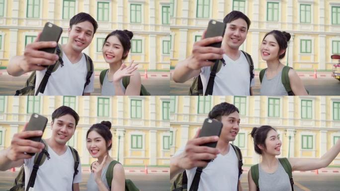 亚洲博主夫妇在泰国曼谷旅行，甜蜜的夫妇使用手机制作vlog并在社交媒体上生活，同时在假日旅行中度过甜