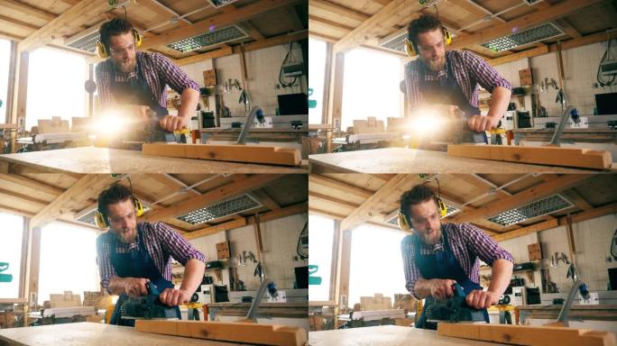 男性木匠使用拼图切割木材的慢动作