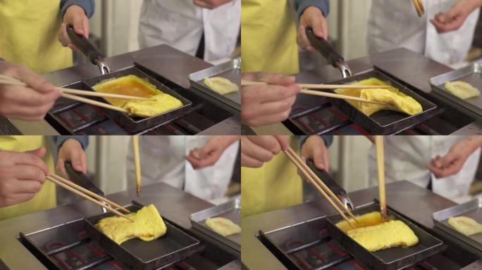亚洲男子在日本手工制作Tamago鸡蛋
