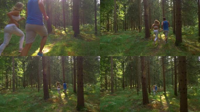 慢动作: 活跃的男人和他的女友在阳光普照的森林中慢跑。