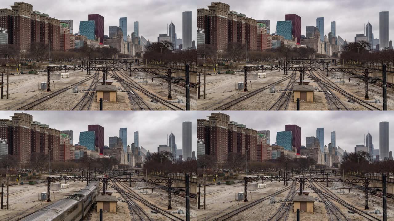 延时: 芝加哥天际线建筑背景的通勤铁路轨道美国芝加哥