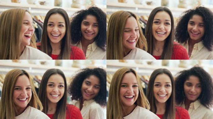 三个微笑的年轻女性一起在时装店购物的头和肩膀肖像 -- 慢动作拍摄