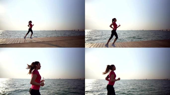 女人在海边慢跑外国女人特写实拍视频锻炼身