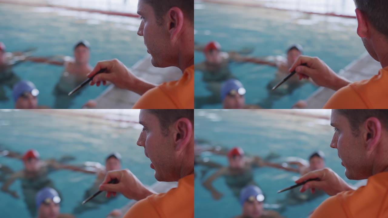 游泳教练与游泳者交谈