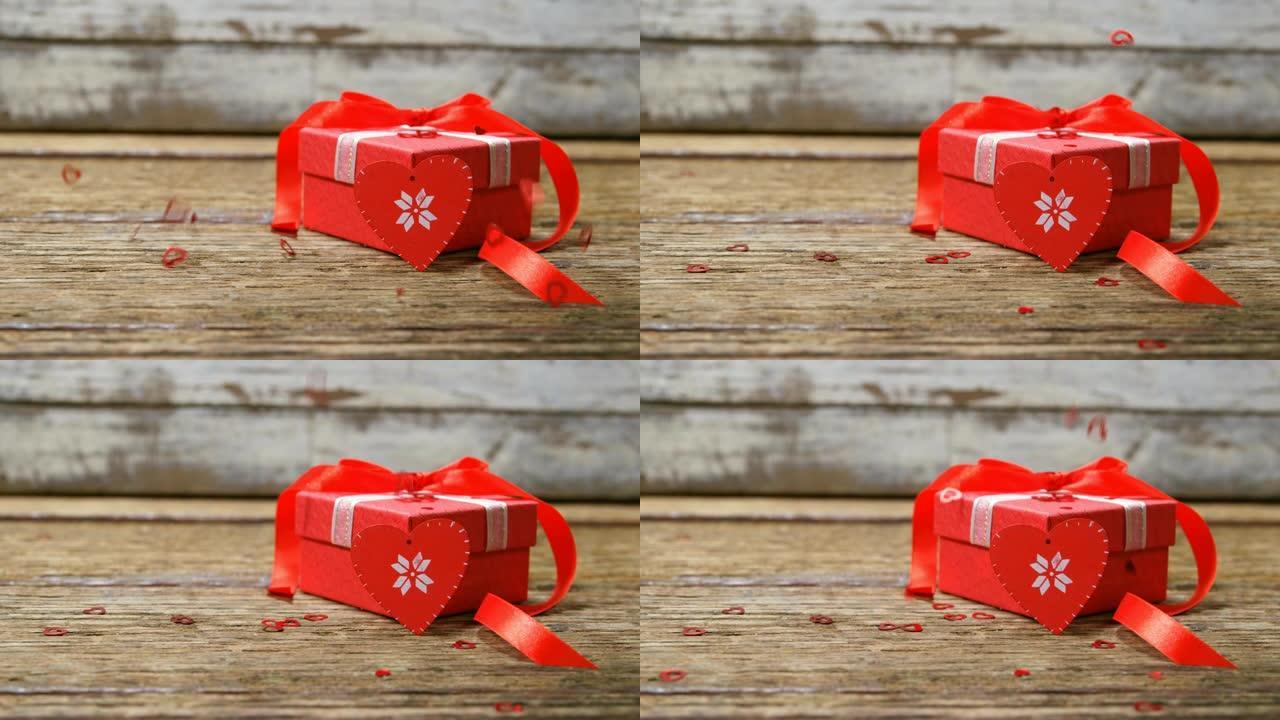 木质表面的红心和礼品盒4k
