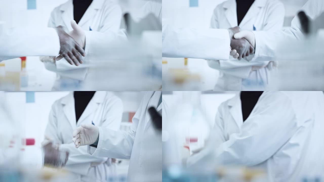 男性在实验室握手男性在实验室握手实验室握