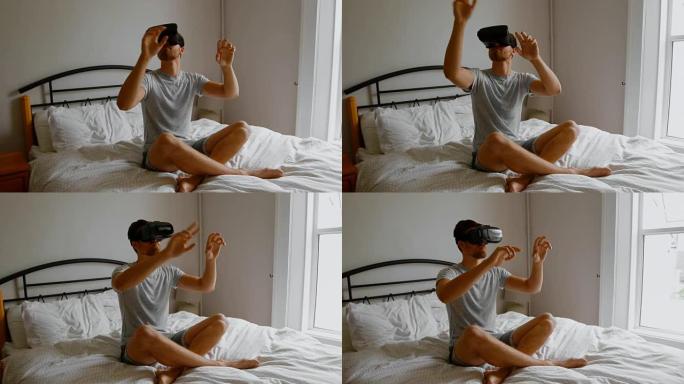男子在卧室4k床上使用虚拟现实耳机