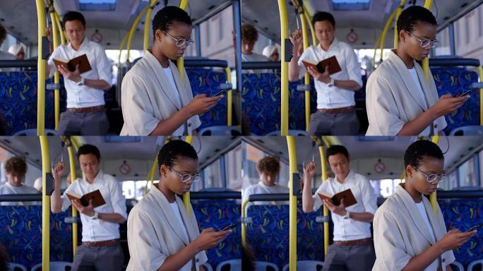 乘坐公交车4k时使用手机的女性通勤者