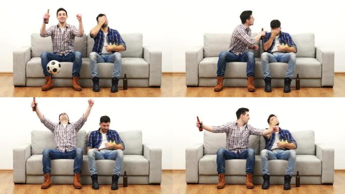 两名男子在白色墙壁背景上的沙发上观看足球