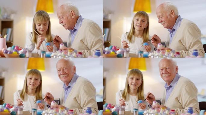 祖父和孙女为复活节做准备的肖像