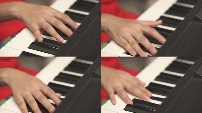 特写年轻的亚洲女孩在钢琴课上手工学习