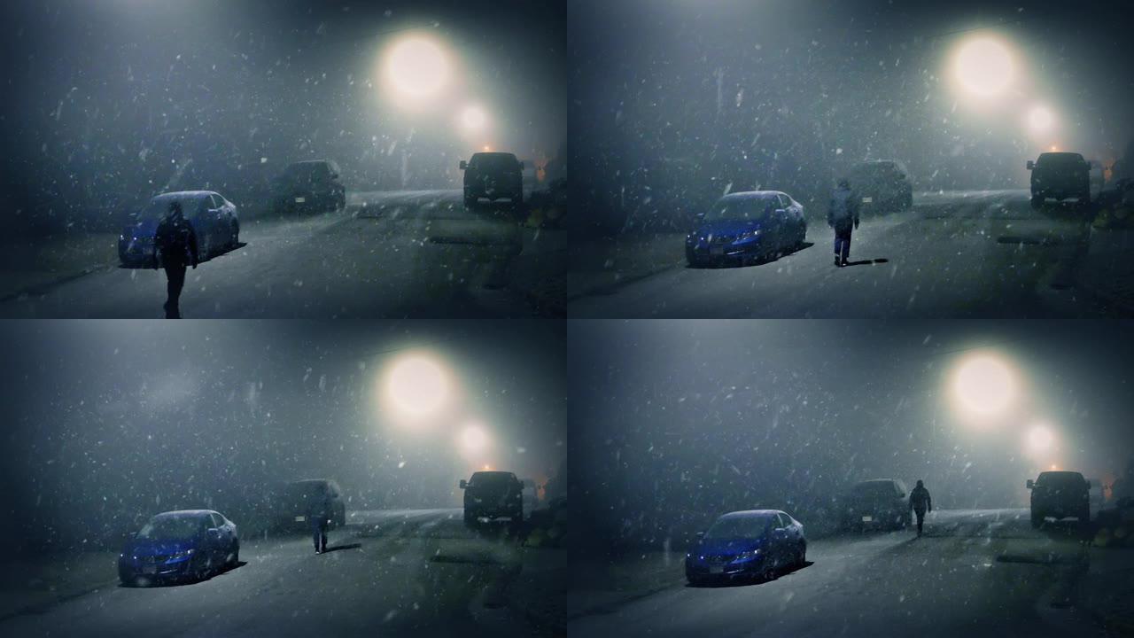 男子在暴风雪中走过汽车