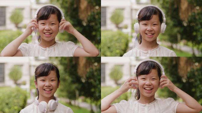 台湾一个公共公园听音乐的年轻女孩