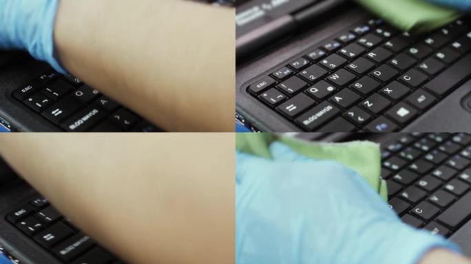 戴着蓝色手套的女工在擦拭新的笔记本电脑。