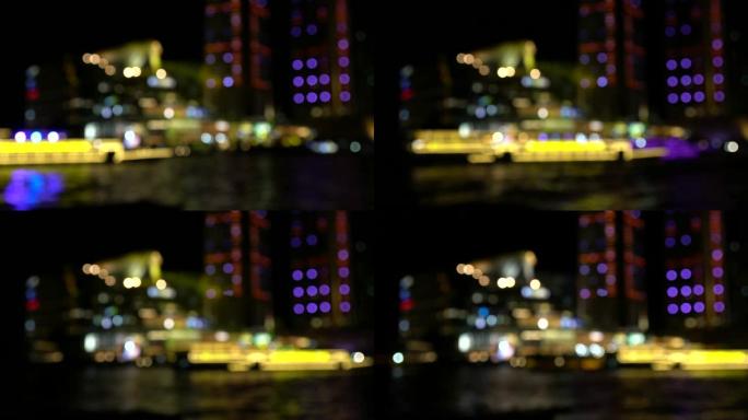4k镜头模糊的散焦城市场景闪烁闪烁的灯光在夜间呈现，背景为bokeh，以新年快乐和派对概念庆祝