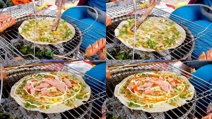 在越南南部制作Banh Trang Nuong, flat rice crackers pizza 