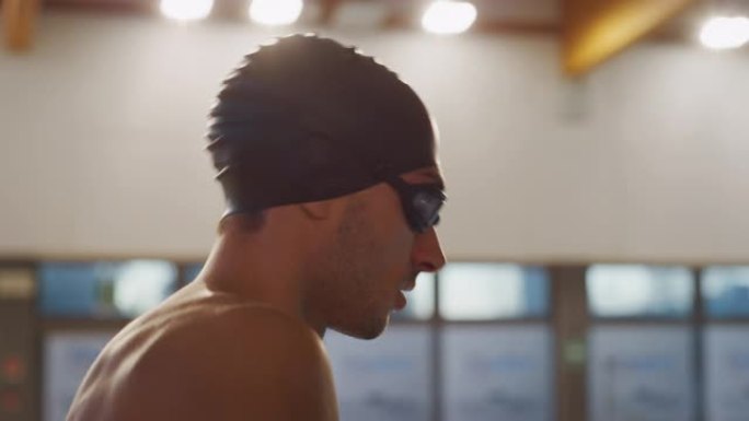 谷歌职业游泳运动员的肖像对他在游泳池的成绩感到满意。
