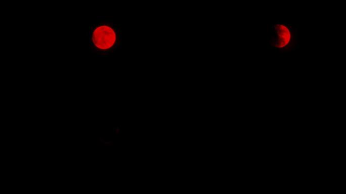 乌云笼罩邪恶的红月亮在晚上