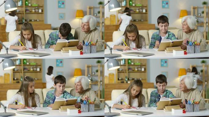 孩子和奶奶一起做作业，而妈妈和宝宝在一起