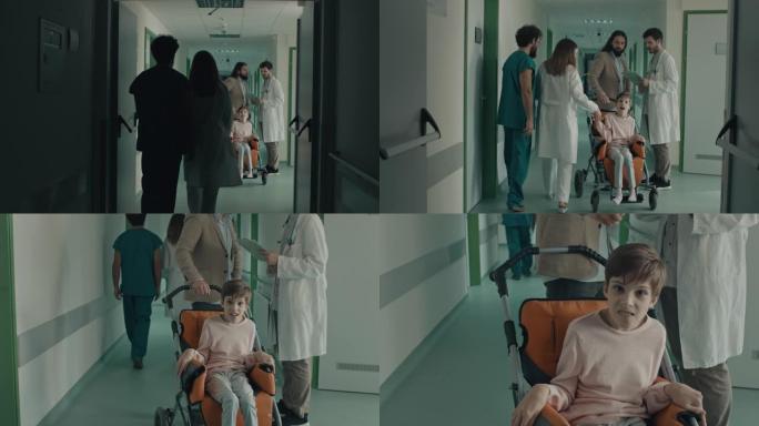 医生与坐在轮椅上的女孩的男人交谈