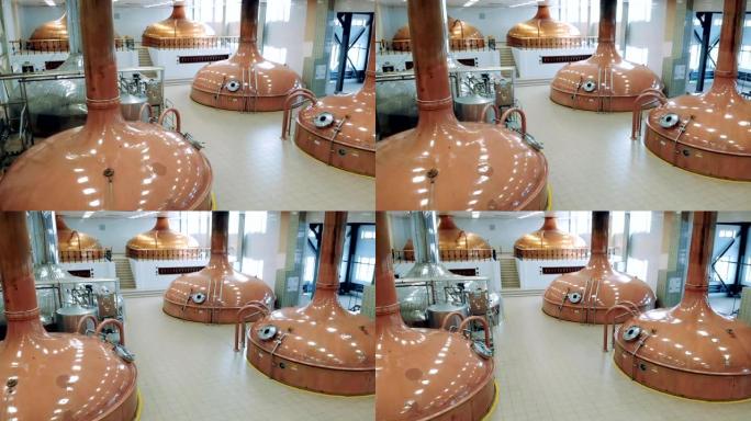 带铜槽的宽敞啤酒厂大厅